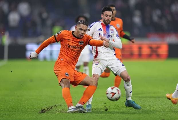 12.12.2024, Fussball UEFA Europa League, Olympique Lyon - Eintracht Frankfurt, emonline, emspor, v.l., Pharell Nnamdi Collins (Eintracht Frankfurt), Nicolas Tagliafico (Olympique Lyon) DFL DFB REGULATIONS PROHIBIT ANY USE OF PHOTOGRAPHS AS IMAGE SEQUENCES AND OR QUASI-VIDEO. xdcx Copyright: HMBxMedia Claus