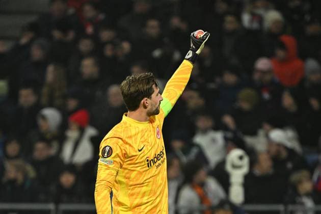 12.12.2024, xjhx, Fussball UEFA Europa League, Olympique Lyon - Eintracht Frankfurt emspor, v.l. Torjubel nach dem Tor zum celebrating the goal celebrate 0:1 durch Ansgar Knauff (Eintracht Frankfurt) bei Kevin Trapp (Eintracht Frankfurt) (DFL DFB REGULATIONS PROHIBIT ANY USE OF PHOTOGRAPHS as IMAGE SEQUENCES and or QUASI-VIDEO) Lyon
