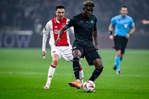 AFC Ajax Amsterdam forwarder Steven Berghuis, Lazio midfielder Fisayo Dele-Bashiru, during the match Ajax - Lazio at the Johan Cruijff ArenA for the UEFA Europa League - League phase - Matchday 6 season 2024-2025 in AMSTERDAM, Netherlands on 12 december 2024, (photo by Stefan Koops EYE4images DeFodi Images) Defodi-746_203895