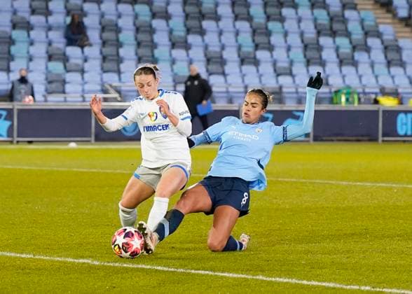 Manchester, England, 12th December 2024. Mary Fowler of Manchester City has a shot blocked by Chiara D Angelo of St Polten during the UEFA Womens Champions League match at the Academy Stadium, Manchester. Picture credit should read: Andrew Yates Sportimage EDITORIAL USE ONLY. No use with unauthorised audio, video, data, fixture lists, club league logos or live services. Online in-match use limited to 120 images, no video emulation. No use in betting, games or single club league player publications. SPI-3522-0010