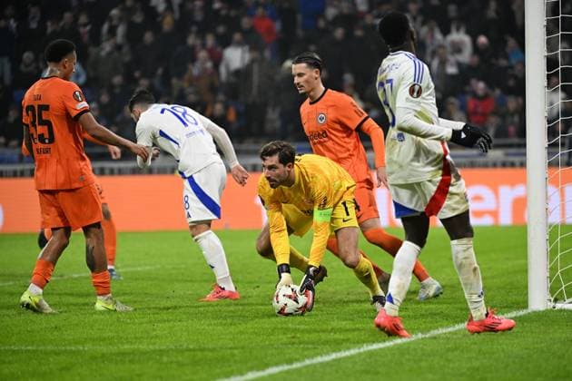 12.12.2024, xjhx, Fussball UEFA Europa League, Olympique Lyon - Eintracht Frankfurt emspor, v.l. Tuta (Eintracht Frankfurt) Rayan Cherki (Olympique Lyon) Kevin Trapp (Eintracht Frankfurt) Robin Koch (Eintracht Frankfurt) Ernest Nuamah (Olympique Lyon) (DFL DFB REGULATIONS PROHIBIT ANY USE OF PHOTOGRAPHS as IMAGE SEQUENCES and or QUASI-VIDEO) Lyon