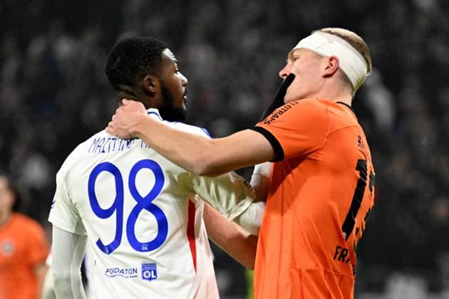 12.12.2024, xjhx, Fussball UEFA Europa League, Olympique Lyon - Eintracht Frankfurt emspor, v.l. Ainsley Maitland-Niles (Olympique Lyon) Rasmus Kristensen (Eintracht Frankfurt) (DFL DFB REGULATIONS PROHIBIT ANY USE OF PHOTOGRAPHS as IMAGE SEQUENCES and or QUASI-VIDEO) Lyon