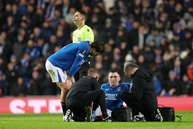 John Souttar of Rangers sits injured during the Europa League group phase match at Ibrox Stadium, Glasgow. Rangers v Tottenham Hotspur, UEFA Europa League, Football, Ibrox Stadium, Glasgow, Scotland, UK - 12 Dec 2024 EDITORIAL USE ONLY No use with unauthorised audio, video, data, fixture lists, club league logos or live services. Online in-match use limited to 120 images, no video emulation. No use in betting, games or single club league player publications. Copyright: xKirkxO Rourke RangersxFC Shutterstockx 14998166bv