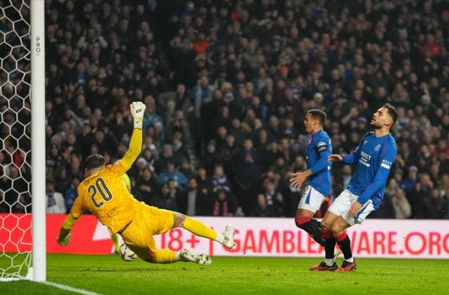 Nedim Bajrami of Rangers reacts after his shot was saved by Tottenham Hotspur goalkeeper Fraser Forster. Rangers v Tottenham Hotspur, UEFA Europa League, Group Stage, Football, Ibrox Stadium, Glasgow, Scotland - 12 Dec 2024 EDITORIAL USE ONLY No use with unauthorised audio, video, data, fixture lists, club league logos or live services. Online in-match use limited to 120 images, no video emulation. No use in betting, games or single club league player publications. Copyright: xStuartxWallace Shutterstockx 14985154bw