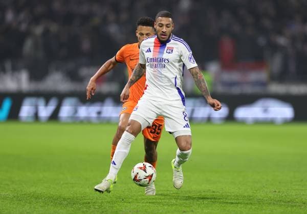 12.12.2024, Fussball UEFA Europa League, Olympique Lyon - Eintracht Frankfurt, emonline, emspor, v.l., Tuta Lucas Silva Melo (Eintracht Frankfurt), Corentin Tolisso (Olympique Lyon) DFL DFB REGULATIONS PROHIBIT ANY USE OF PHOTOGRAPHS AS IMAGE SEQUENCES AND OR QUASI-VIDEO. xdcx Copyright: HMBxMedia Claus