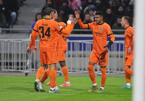 12.12.2024, Fussball UEFA Europa League, Olympique Lyon - Eintracht Frankfurt, emonline, emspor, v.l., Torjubel zum 0:1 durch Ansgar Knauff (Eintracht Frankfurt), Pharell Nnamdi Collins (Eintracht Frankfurt), Goal celebration, celebrate the goal DFL DFB REGULATIONS PROHIBIT ANY USE OF PHOTOGRAPHS AS IMAGE SEQUENCES AND OR QUASI-VIDEO. xdcx Copyright: HMBxMedia Claus