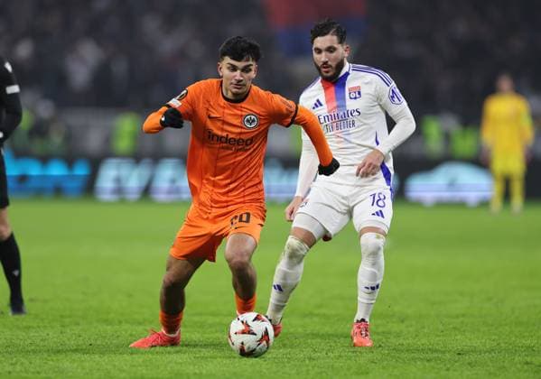 12.12.2024, Fussball UEFA Europa League, Olympique Lyon - Eintracht Frankfurt, emonline, emspor, v.l., Can Uzun (Eintracht Frankfurt), Rayan Cherki (Olympique Lyon) DFL DFB REGULATIONS PROHIBIT ANY USE OF PHOTOGRAPHS AS IMAGE SEQUENCES AND OR QUASI-VIDEO. xdcx Copyright: HMBxMedia Claus