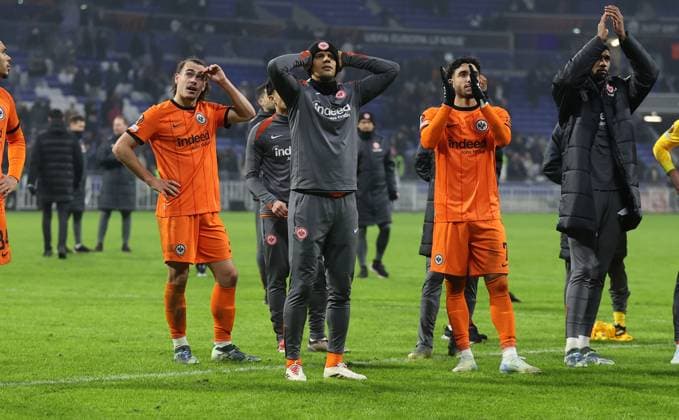 12.12.2024, Fussball UEFA Europa League, Olympique Lyon - Eintracht Frankfurt, emonline, emspor, v.l., Arthur Theate (Eintracht Frankfurt), Timothy Chandler (Eintracht Frankfurt), Omar Marmoush (Eintracht Frankfurt) enttaeuscht, enttaeuscht schauend, dissapointed, traurig, frustiert, frust, gefrustet DFL DFB REGULATIONS PROHIBIT ANY USE OF PHOTOGRAPHS AS IMAGE SEQUENCES AND OR QUASI-VIDEO. xdcx Copyright: HMBxMedia Claus