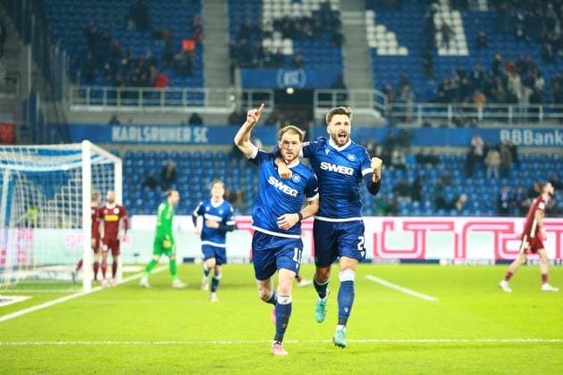 13.12.2024, xrekx, Fussball 2.Bundesliga, Karlsruher SC - Jahn Regensburg emspor, v.l. Budu Zivzivadze Fabian Schleusener (Karlsruher SC) bejubeln das 1:1 (DFL DFB REGULATIONS PROHIBIT ANY USE OF PHOTOGRAPHS as IMAGE SEQUENCES and or QUASI-VIDEO) Karlsruhe