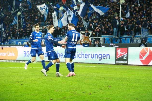13.12.2024, xrekx, Fussball 2.Bundesliga, Karlsruher SC - Jahn Regensburg emspor, v.l. Luca Pfeiffer (Karlsruher SC) Dzenis Burnic (Karlsruher SC) Budu Zivzivadze (Karlsruher SC) bejubeln das 3:2 (DFL DFB REGULATIONS PROHIBIT ANY USE OF PHOTOGRAPHS as IMAGE SEQUENCES and or QUASI-VIDEO) Karlsruhe
