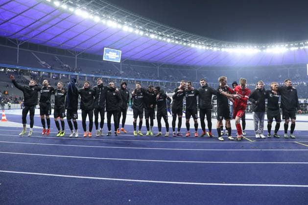 13.12.2024, xtgx, Fussball - 2.Bundesliga, Hertha BSC Berlin - Preussen Muenster emspor, v.l. Muenster Jubel ueber den Sieg, Jubel nach Spielende (DFL DFB REGULATIONS PROHIBIT ANY USE OF PHOTOGRAPHS as IMAGE SEQUENCES and or QUASI-VIDEO) Berlin