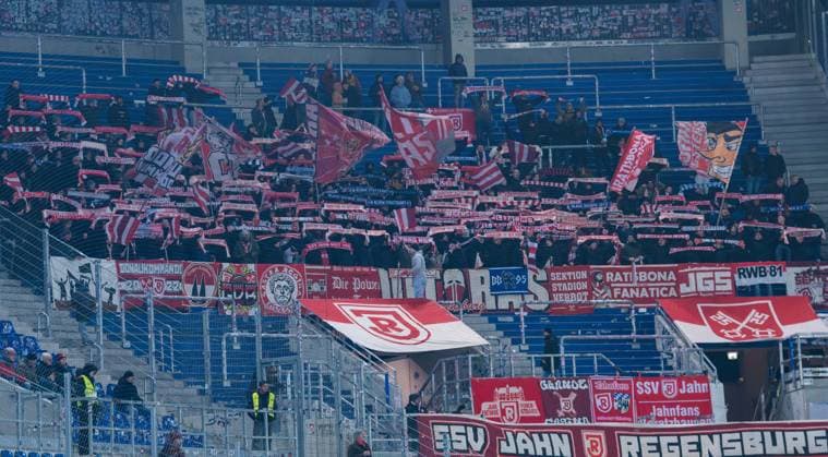 Fans von Jahn Regensburg waehrend des Spiels in der 2. Bundesliga zwischen dem Karlsruher SC und Jahn Regensburg im BBBank Wildpark am 13. December 2024 in Karlsruhe, Deutschland. (Foto von Silas Schueller DeFodi Images) +++ Fans Jahn Regensburg during the 2. Bundesliga match between Karlsruher SC and Jahn Regensburg at BBBank Wildpark on December 13, 2024 in Karlsruhe, Germany. (Photo by Silas Schueller DeFodi Images) DFB DFL REGULATIONS PROHIBIT ANY USE OF PHOTOGRAPHS AS IMAGE SEQUENCES AND OR QUASI-VIDEO. (Photo by Silas Schueller DeFodi Images) Defodi-738_738_KSCREG_20241213_226