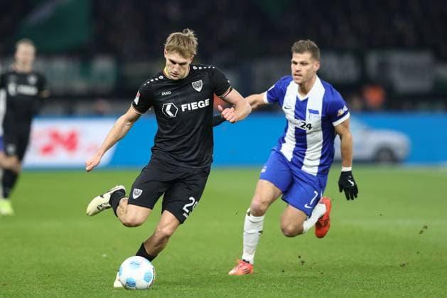 13.12.2024, xtgx, Fussball 2. Bundesliga, Hertha BSC Berlin - SC Preussen Muenster emspor, v.l. Lukas Frenkert (Münster, 29), Florian Niederlechner (Hertha, 7) (DFL DFB REGULATIONS PROHIBIT ANY USE OF PHOTOGRAPHS as IMAGE SEQUENCES and or QUASI-VIDEO) Berlin