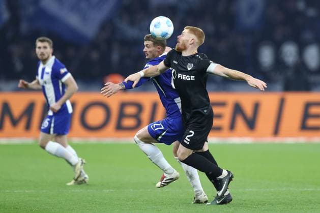 13.12.2024, xtgx, Fussball 2. Bundesliga, Hertha BSC Berlin - SC Preussen Muenster emspor, v.l. Michael Cuisance (Hertha, 27), Mikkel Kirkesov (Münster, 2) (DFL DFB REGULATIONS PROHIBIT ANY USE OF PHOTOGRAPHS as IMAGE SEQUENCES and or QUASI-VIDEO) Berlin