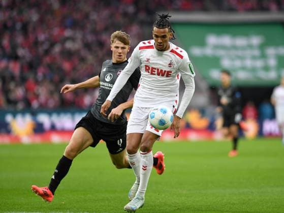 Finn Jeltsch (1. FC Nuernberg) und Damion Downs (1. FC Koeln) im Zweikampf waehrend des Spiels der 2. Bundesliga zwischen dem 1. FC Köln und 1. FC Nürnberg im RheinEnergieStadion am 15. December 2024 in Köln, Deutschland. (Foto von Ralf Treese DeFodi Images) +++ Finn Jeltsch (1. FC Nuernberg) und Damion Downs (1. FC Koeln) battle for the ball during the 2. Bundesliga match between 1. FC Köln and 1. FC Nürnberg at RheinEnergieStadion on December 15, 2024 in Cologne, Germany. (Photo by Ralf Treese DeFodi Images) DFB DFL REGULATIONS PROHIBIT ANY USE OF PHOTOGRAPHS AS IMAGE SEQUENCES AND OR QUASI-VIDEO. Defodi-521_KOEFCN20241215_012