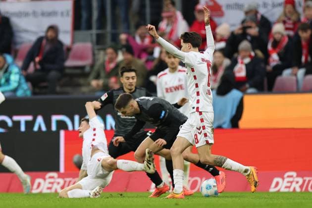 GER, 2.FBL, 1. FC Koeln vs. 1. FC Nuernberg 15.12.2024, Rheinenergie Stadion, Koeln, GER, 2.FBL, 1. FC Koeln vs. 1. FC Nuernberg, im Bild: Stefanos Tzimas (1. FC Nuernberg 9), im Zweikampf gegen Denis Huseinbasic (FC Koeln 8), Eric Martel (FC Koeln 6),