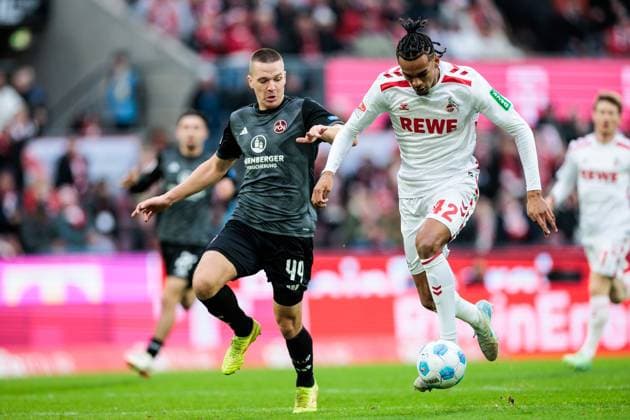 2. Fußball Bundesliga: 1. FC Köln - 1. FC Nürnberg; 15.12.2024 Zweikampf Ondrej Karafiat (1. FC Nürnberg, 44), Damion Downs (1. FC Köln, 42) 2. Fußball Bundesliga: 1. FC Köln - 1. FC Nürnberg, Köln, Rheinenergiestadion am 15.12.2024 DFL REGULATIONS PROHIBIT ANY USE OF PHOTOGRAPHS AS IMAGE SEQUENCES AND OR QUASI-VIDEO.