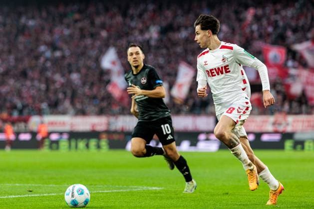 2. Fußball Bundesliga: 1. FC Köln - 1. FC Nürnberg; 15.12.2024 Zweikampf Julian Justvan (1. FC Nürnberg, 10), Denis Huseinbasic (1. FC Köln, 8) 2. Fußball Bundesliga: 1. FC Köln - 1. FC Nürnberg, Köln, Rheinenergiestadion am 15.12.2024 DFL REGULATIONS PROHIBIT ANY USE OF PHOTOGRAPHS AS IMAGE SEQUENCES AND OR QUASI-VIDEO.