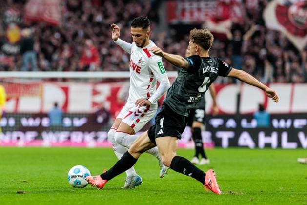 2. Fußball Bundesliga: 1. FC Köln - 1. FC Nürnberg; 15.12.2024 Zweikampf Leart Paqarada (1. FC Köln, 17), Finn Jeltsch (1. FC Nürnberg, 4) 2. Fußball Bundesliga: 1. FC Köln - 1. FC Nürnberg, Köln, Rheinenergiestadion am 15.12.2024 DFL REGULATIONS PROHIBIT ANY USE OF PHOTOGRAPHS AS IMAGE SEQUENCES AND OR QUASI-VIDEO.