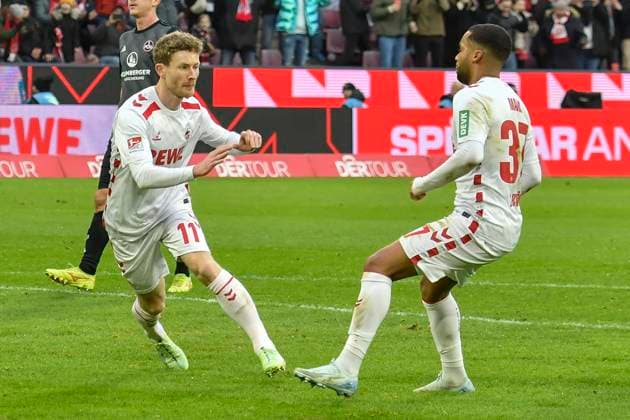 Florian Kainz (Koeln 11) jubelt nach dem Tor zum 2:0, Linton Maina (Koeln 37) (re.) 15.12.2024 Fussball 1. FC Koeln vs 1. FC Nuernberg, Rheinenergiestadion, Koeln, DFB DFL REGULATIONS PROHIBIT ANY USE OF PHOTOGRAPHS AS IMAGE SEQUENCES AND OR QUASI-VIDEO NRW Germany
