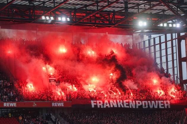 Fußball 2. Bundesliga 16. Spieltag 1. FC Köln - 1. FC Nürnberg am 15.12.2024 im RheinEnergieStadion in Köln Fans zündeln Bengalos Pyrotechnik Pyro Leuchtkörper Rauchbomben im Fanblock von Nürnberg DFL regulations prohibit any use of photographs as image sequences and or quasi-video.