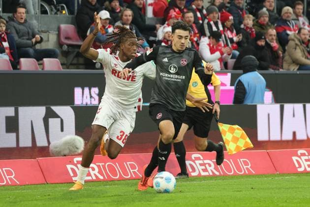 Jens Castrop (Nuernberg 17) und Elias Bakatukanda (Koeln 38), GER, 1. FC Koeln vs. 1. FC Nuernberg , 2. Fussball-Bundesliga, 16. Spieltag, Saison 2024 2025, 15.12.2024, DFL REGULATIONS PROHIBIT ANY USE OF PHOTOGRAPHS AS IMAGE SEQUENCES AND OR QUASI-VIDEO, GER, 1. FC Koeln vs. 1. FC Nuernberg , 2. Fussball-Bundesliga, 16. Spieltag, Saison 2024 2025, 15.12.2024 Koeln