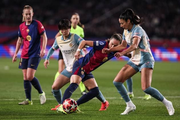 December 18, 2024, Barcelona, Barcelona, Spain: Ewa Pajor of FC Barcelona, Barca Femenino, Aoba Fujino and Leila Ouahabi of Manchester City FC compete for the ball during the UEFA WomenÃ¢â‚¬â ¢s Champions League Group Stage MD6, football match played between FC Barcelona and Manchester City FC at Estafi Olimpic Lluis Companys on December 18, 2024 in Barcelona, Spain. Barcelona Spain - ZUMAa181 20241218_zaa_a181_047 Copyright: xJavierxBorregox