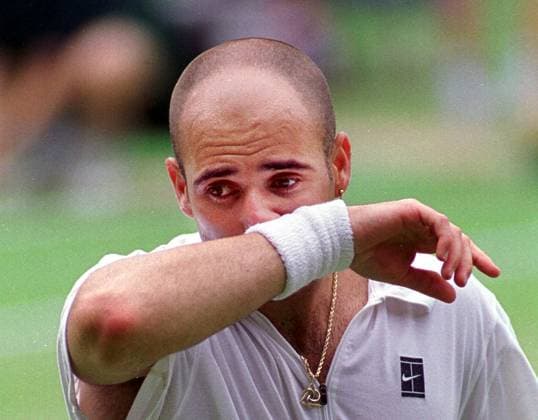 Andre Agassi at Wimbledon Tennis Championships 1999 Andre Agassi looking upset at Mens Final game against Pete Sampras Andre Agassi Wimbledon Tennis Championships 1999 DMGTCHPDPICT000411562762