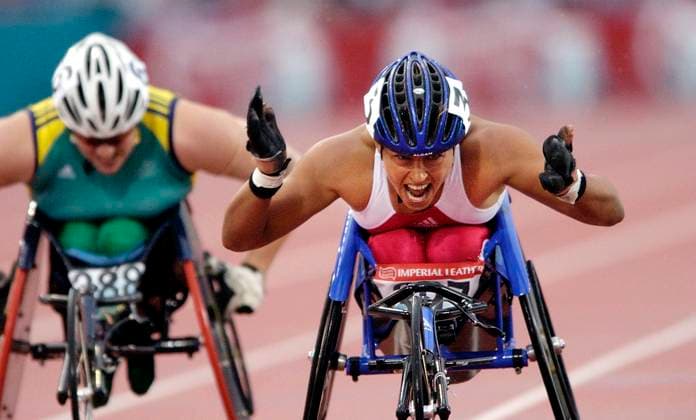 COMMONWEALTH GAMES MANCHESTER 31 7 2002 WOMEN S 800m WHEELCHAIR WINNER CHANTAL PETITCLERC CROSSES THE LINE PICTURE DAVID ASHDOWN. COMMONWEALTH GAMES MANCHESTER COMMONWEALTH GAMES MANCHESTER DMGTCHPDPICT000376998142