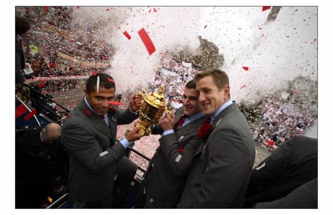 The England World Champion squad on their VICTORY parade through the streets of London. POOL PIC photograph by David Sandison The Independent 8 12 2003 DMGTCHPDPICT000411326026