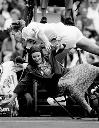 CHRIS BAILEY KNOCKS OVER THE NETCORD JUDGE DURING HIS CENTRE COURT MATCH WITH GORAN IVANISEVIC, 1993. PICTURE DAVID ASHDOWN 5belter.jpg DMGTCHPDPICT000349933394