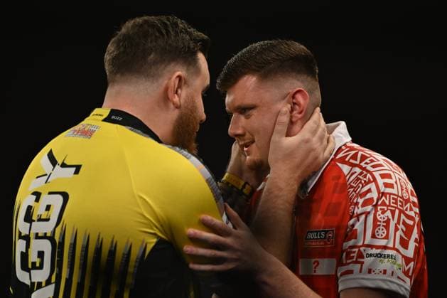 Sport Themen der Woche KW51 19th December 2024, Alexandra Palace, London, England; 2024 25 PDC Paddy Power World Darts Championships Day 5; Scott Williams versus Niko Springer in their first round match, Scott Williams embraces Niko Springer after their match  ActionPlus12728647 SimonxWest