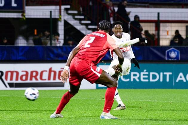 FOOTBALL : Rouen vs Lille - Coupe de France - 20 12 2024 Jonathan David ( 9 - Lille ) and DANY GOPROU ( 2 - Rouen ) during the French Cup match between FC Rouen and Lille OSC at Stade Robert Diochon on December 20, 2024 in Rouen, France. ( Photo by Dante Badano PsnewZ ) - RouenFrance  Copyright: xDantexBadanox