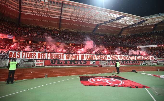 Sport Themen der Woche KW51 Sport Bilder des Tages 21.12.2024 - Fussball - Saison 2024 2025 - 2. Fussball - Bundesliga - 17. Spieltag: 1. FC Nürnberg FCN ( Club ) - Eintracht Braunschweig EBS BTSV - Sportfoto Zink DaMa - xdaxmax - DFL regulations prohibit any use of photographs as image sequences and or quasi-video - only for editorial use - Clubfan Clubfans FCN-Fans Fans wünschen Frohe Weihnachten - Pyrotechnik Pyro Bengalfackel Bengalfackeln Rauch *** 21 12 2024 Soccer Season 2024 2025 2 Soccer Bundesliga 17 Matchday 1 FC Nürnberg FCN Club Eintracht Braunschweig EBS BTSV Sportfoto Zink DaMa xdaxmax DFL regulations prohibit any use of photographs as image sequences and or quasi video only for editorial use Clubfan Clubfans FCN Fans Fans Fans wish Merry Christmas Pyrotechnics Pyro Bengal torches Bengal torches Smoke