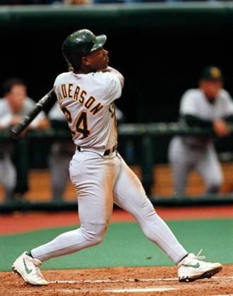 April 28, 1998, St. Petersburg, Florida, USA: Rickey Henderson connects on a fourth inning home run, taking his time as he rounds the bases with what proves to be the winning run Tuesday, as Oakland beat the Devil Rays, 4-3.. Times :.Jonathan Newton.Credit Image: via ZUMA Press Wire) ST. PETERSBURG USA - ZUMAs70_ 19980428_zaf_s70_015 Copyright: xTampaxBayxTimesx