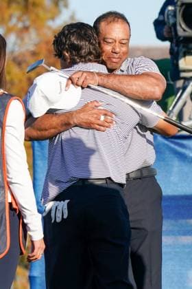 December 21, 2024, Orlando, Florida, USA: Tiger Woods (R) embraces Charlie Woods on the 18th green after the first round of the PNC Championship at the Ritz-Carlton Golf Club. Orlando USA - ZUMAw109 20241221_fap_w109_010 Copyright: xDebbyxWongx