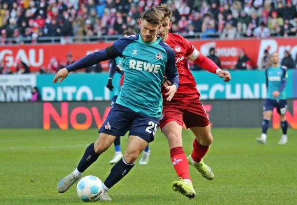 22.12.2024, xmohx, Fussball 2.Bundesliga, 1.FC Kaiserslautern - 1.FC Köln emspor, v.l. Jan Thielmann (Köln), Daniel Hanslik (Kaiserslautern) (DFL DFB REGULATIONS PROHIBIT ANY USE OF PHOTOGRAPHS as IMAGE SEQUENCES and or QUASI-VIDEO) Kaiserslautern