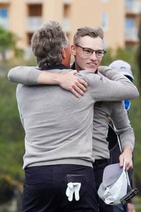 December 22, 2024, Orlando, Florida, USA: Bernhard Langer (L) embraces his son Jason Langer, on the 18th green after the final round of the PNC Championship at the Ritz-Carlton Golf Club. Orlando USA - ZUMAw109 20241222_fap_w109_011 Copyright: xDebbyxWongx