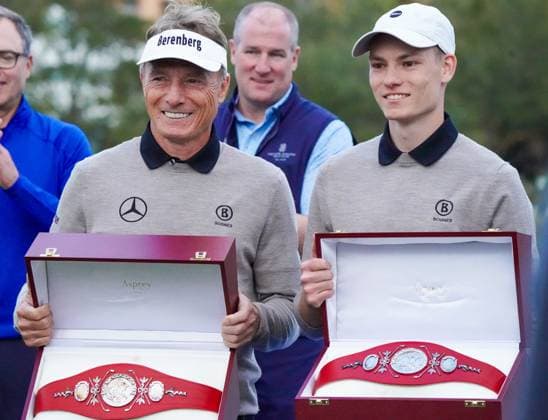 December 22, 2024, Orlando, Florida, USA: Bernhard Langer (L) and his son, Jason Langer hold the Willie Park trophy belts on the 18th green after winning the final round of the PNC Championship at the Ritz-Carlton Golf Club. Orlando USA - ZUMAw109 20241222_fap_w109_003 Copyright: xDebbyxWongx