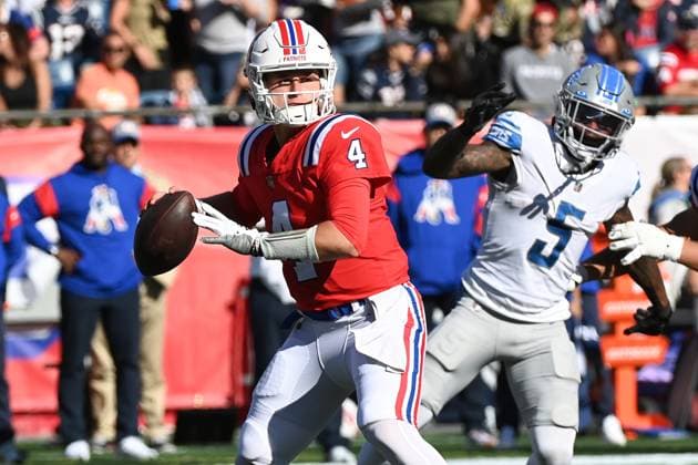 NFL, American Football Herren, USA 2022: Lions vs Patriots OCT 09 Oct 9, 2022; Foxborough, Massachusetts, USA; New England Patriots quarterback Bailey Zappe (4) throws a pass against the Detroit Lions in Foxborough, Massachusetts. Eric Canha CSM Foxborough Massachusetts USA EDITORIAL USE ONLY Copyright: xx ZUMA-20221009_zaf_c04_353.jpg EricxCanhax csmphototwo982592