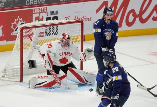 December 26, 2024, Ottawa, On, Canada: p>Finland forward Heikki Ruohonen (28) and forward Julius Miettinen try to screen Canada goaltender Carter George as he makes a save during third period IIHF World Junior Hockey Championship tournament action, Thursday, Dec.26, 2024 in Ottawa. Carter George Julius Miettinen Heikki Ruohonen  - ZUMAc35_ 20241226_zaf_c35_100 Copyright: xAdrianxWyldx