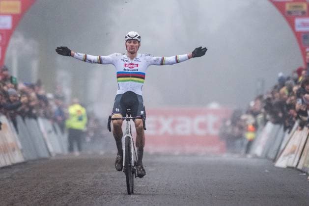 Dutch Mathieu Van Der Poel celebrates as he crosses the finish line to win the men s elite race of the cyclocross cycling event, race 5 7 in the Exact Cross competition, Friday 27 December 2024 in Loenhout. BILLY CEUSTERS BillyxCeusters  x109238651x