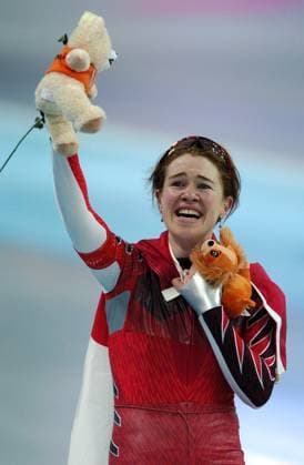 Clara Hughes, of Canada, celebrates her the gold medal run in the Ladies 5000-meter speedskating competition on Saturday, February 25, 2006, at the Oval Lingotto in Turin, Italy during the 2006 Winter Olympics. (Steve Deslich KRT) TURIN ITA EDITORIAL USE ONLY Copyright: xx StevexDeslichx krtphotos313992