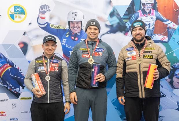 photographer: FIL Michael Kristen 28.12.2024 Austrian Championships, Olympia Ice Track Innsbruck-Igls, Tirol, Austria (AUT), Award Ceremony, Men™s Singles, picture: Wolfgang Kindl (AUT, 2nd place), Jonas Müller (AUT, 1st place), David Gleirscher (AUT, 3rd place)