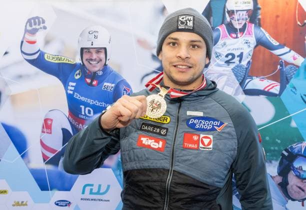 photographer: FIL Michael Kristen 28.12.2024 Austrian Championships, Olympia Ice Track Innsbruck-Igls, Tirol, Austria (AUT), Award Ceremony, Men™s Singles, picture: Jonas Müller (AUT, 1st place)