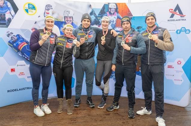 photographer: FIL Michael Kristen 28.12.2024 Austrian Championships, Olympia Ice Track Innsbruck-Igls, Tirol, Austria (AUT), Award Ceremony, winner, picture: Selina Egle, Lara Michaela Kipp (AUT), Jonas Müller (AUT), Madeleine Egle (AUT), Armin Frauscher, Yannick Müller (AUT)
