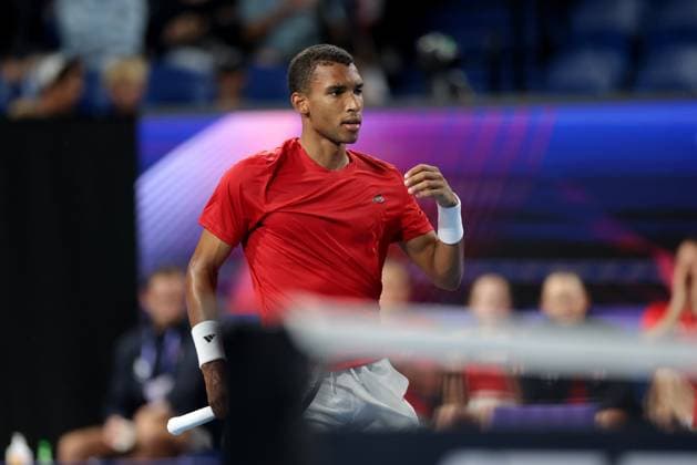 TENNIS UNITED CUP PERTH, FÃ lix Auger-Aliassime of Canada in action against Taylor Fritz of the USA during their group stage match of the 2025 United Cup at RAC Arena in Perth, Sunday, December 29, 2024. ( NO ARCHIVING, EDITORIAL USE ONLY, NO USE IN BOOKS WITHOUT CONSENT PERTH WESTERN AUSTRALIA AUSTRALIA WANGARA  Copyright: xRICHARDxWAINWRIGHTx 20241230138825763943