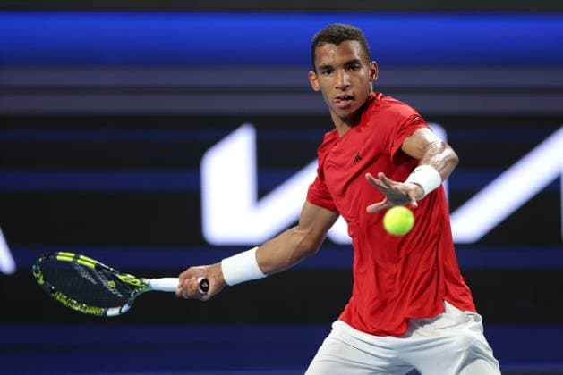 TENNIS UNITED CUP PERTH, FÃ lix Auger-Aliassime of Canada in action against Taylor Fritz of the USA during their group stage match of the 2025 United Cup at RAC Arena in Perth, Sunday, December 29, 2024. ( NO ARCHIVING, EDITORIAL USE ONLY, NO USE IN BOOKS WITHOUT CONSENT PERTH WESTERN AUSTRALIA AUSTRALIA WANGARA  Copyright: xRICHARDxWAINWRIGHTx 20241230165786919960