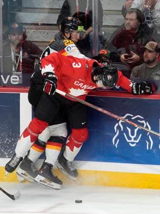 December 29, 2024, Ottawa, On, Canada: Canada defenceman Sam Dickinson (3) collides with Germany forward Julius Sumpf (26) during first period IIHF World Junior Hockey Championship tournament action in Ottawa, Sunday, Dec. 29, 2024. Sam Dickinson Julius Sumpf  - ZUMAc35_ 20241229_zaf_c35_078 Copyright: xAdrianxWyldx