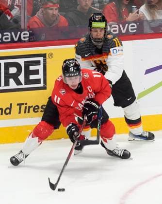 December 29, 2024, Ottawa, On, Canada: Canada forward Brayden Yager (11) stickhandles the puck away from Germany forward David Lewandowski, right, during first period IIHF World Junior Hockey Championship tournament action in Ottawa, Sunday, Dec. 29, 2024. David Lewandowski Brayden Yager  - ZUMAc35_ 20241229_zaf_c35_086 Copyright: xAdrianxWyldx